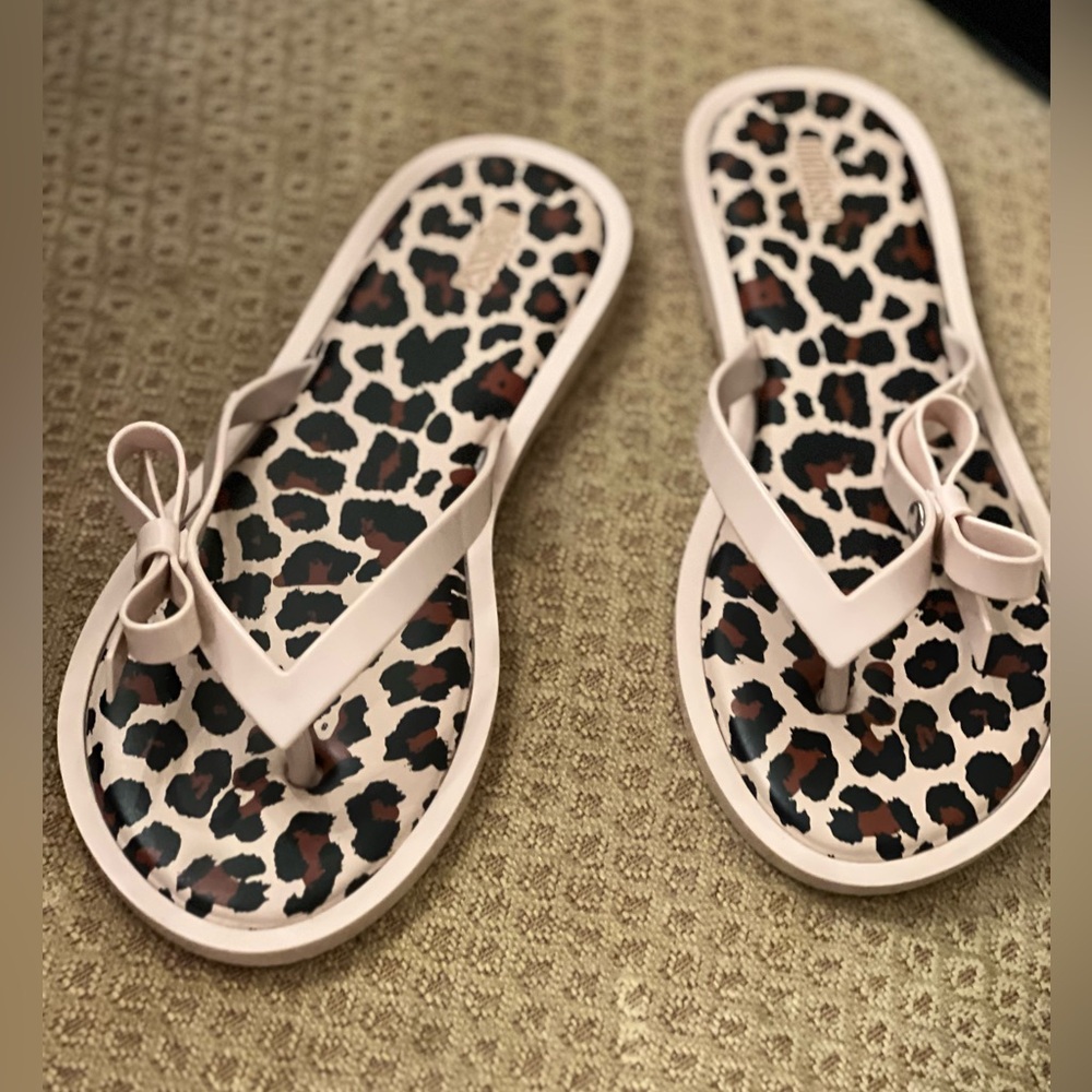 Melissa leopard and tan flip flops